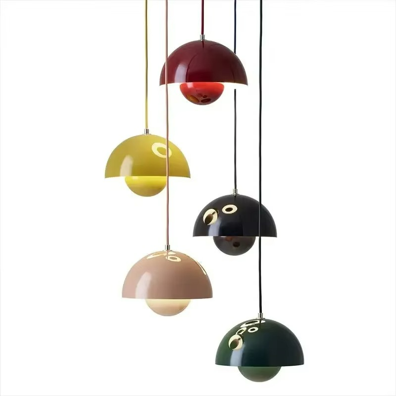 Colorful hanging pendant lights on a white background