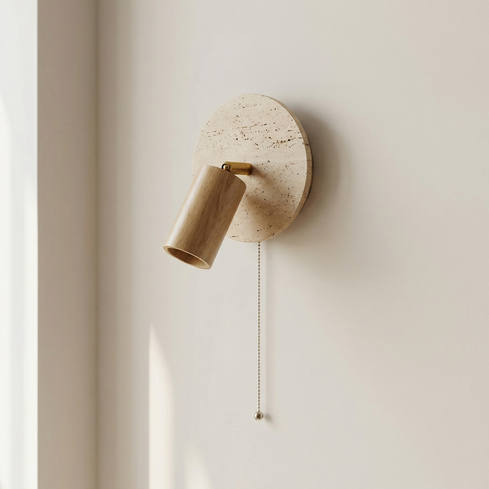 Wall-mounted lamp with terrazzo design on a neutral wall