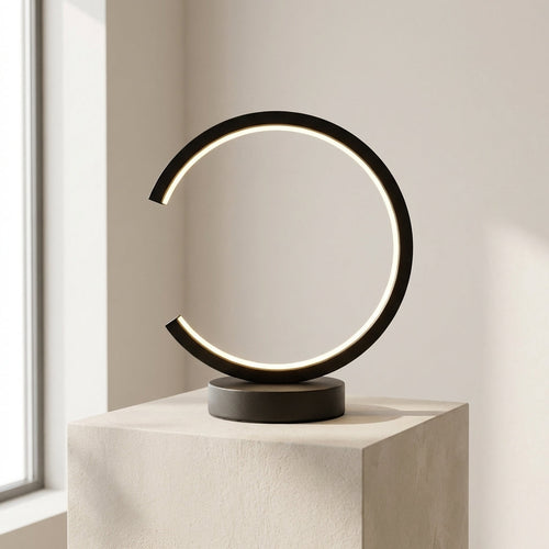Modern table lamp with circular design on a neutral background